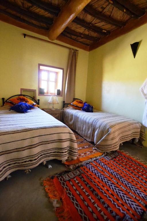 Tizourgane Kasbah Hotel Tiguissas Bilik gambar